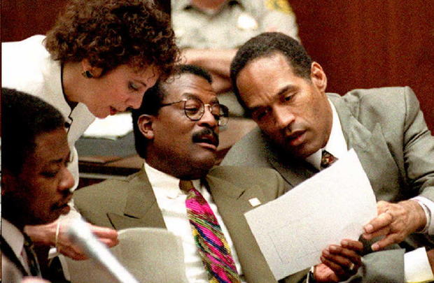 Murder defendant O.J. Simpson (R), prosecutor Marc